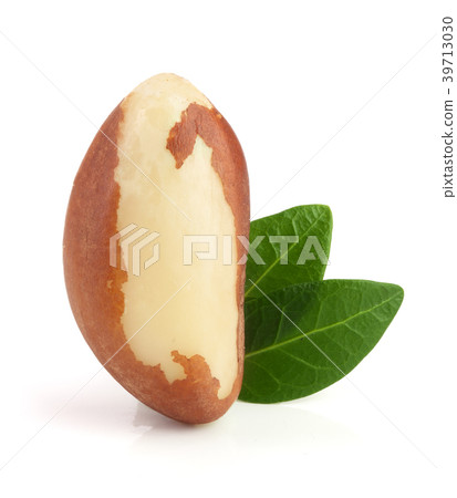 Brazil nuts with leaves isolated on white 39713030