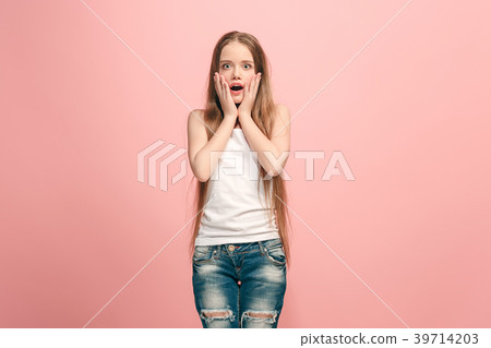 Beautiful teen girl looking suprised isolated on Beautiful teen girl looking suprised isolated on 39714203