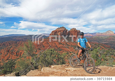Mountain biker in the red rocks, Sedona, USA Mountain biker in the red rocks, Sedona, USA 39715984