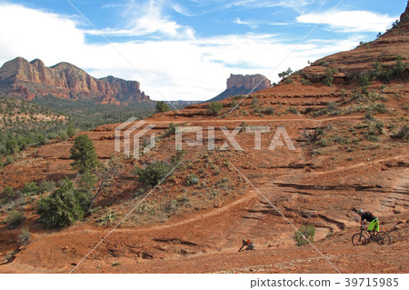 Mountain biker in the red rocks, Sedona, USA Mountain biker in the red rocks, Sedona, USA 39715985