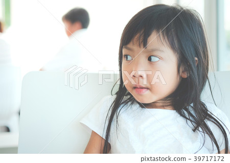 child girl wearing white shirt looking something 39717172