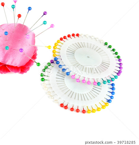 Pillow for needles and bright  pins isolated  39718285