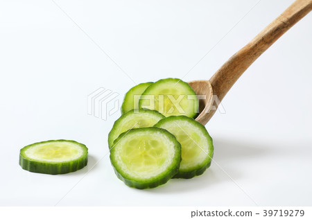 slices of green cucumber slices of green cucumber 39719279