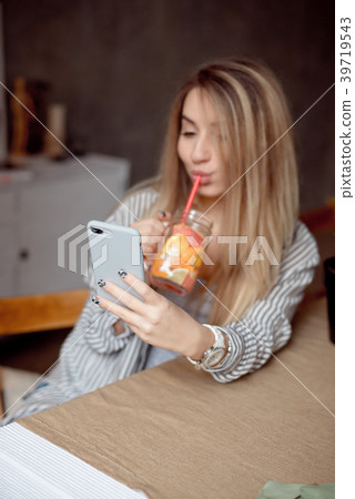 Young woman enjoing with fresh summer lemonade Young woman enjoing with fresh summer lemonade 39719543
