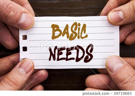 Handwritten text sign showing Basic Needs 39719665