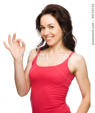 Woman is showing OK sign Woman is showing OK sign 39720316