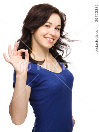 Woman is showing OK sign 39720382