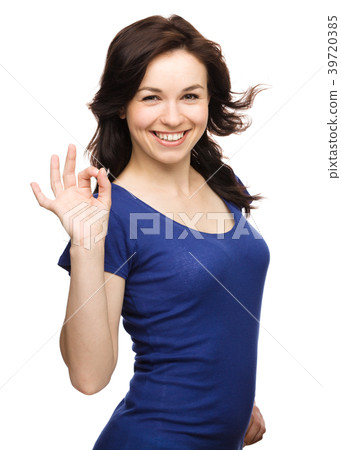 Woman is showing OK sign Woman is showing OK sign 39720385