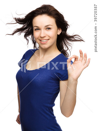 Woman is showing OK sign Woman is showing OK sign 39720387