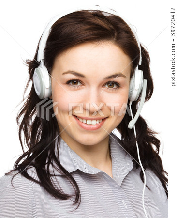 Lovely young woman is talking to customers Lovely young woman is talking to customers 39720412