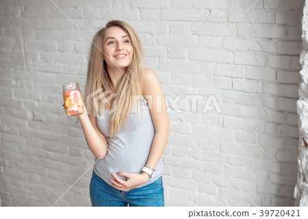 Young woman enjoing with fresh summer lemonade Young woman enjoing with fresh summer lemonade 39720421