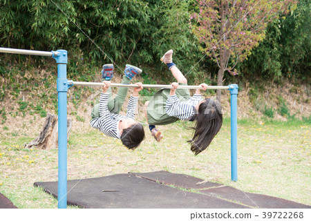 Children playing iron bars Children playing iron bars 39722268