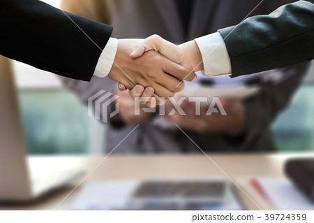 Business  Successful  handshake and business  39724359