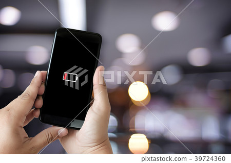 Close up man hands using smart phone battery 39724360