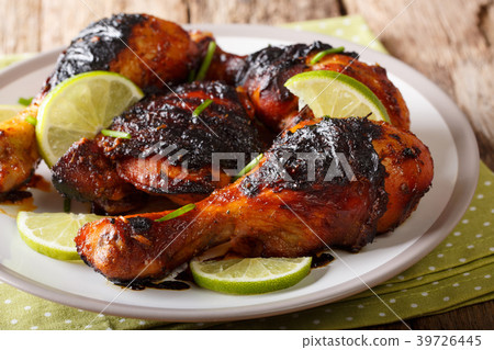 Caribbean grilled chicken drumstick with lime 39726445