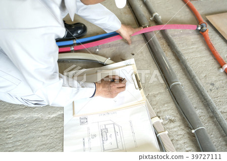 Workers checking apartment, renovation, water supply and drainage work, inclination Workers checking apartment, renovation, water supply and drainage work, inclination 39727111