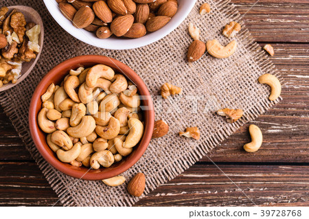 Variety of nuts in bowl 39728768