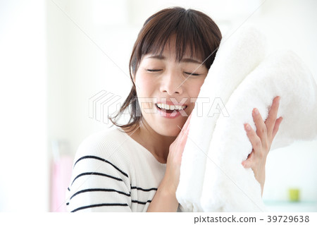 A woman with a bath towel A woman with a bath towel 39729638