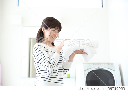 A woman with a bath towel 39730063