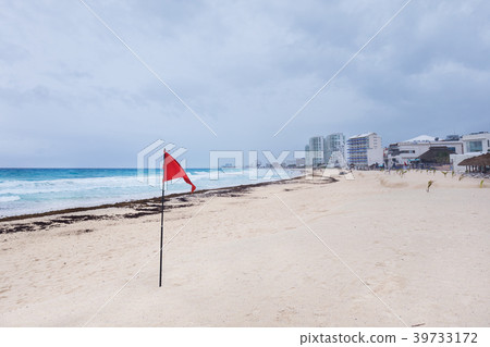 Lifeguard red flag on caribbean beach Lifeguard red flag on caribbean beach 39733172