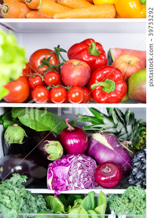 Colorful vibrant fresh vegetables in refrigerator Colorful vibrant fresh vegetables in refrigerator 39733292