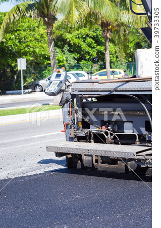 Pavement truck laying fresh asphalt Pavement truck laying fresh asphalt 39733305