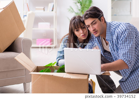 Young family moving in to new apartment after Young family moving in to new apartment after 39734152