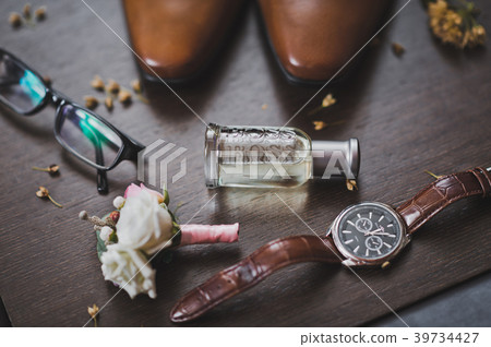 Men glasses watches and perfume with a boots 712. Men glasses watches and perfume with a boots 712. 39734427