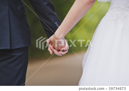 A large photo of the hands of the hugs 39734873