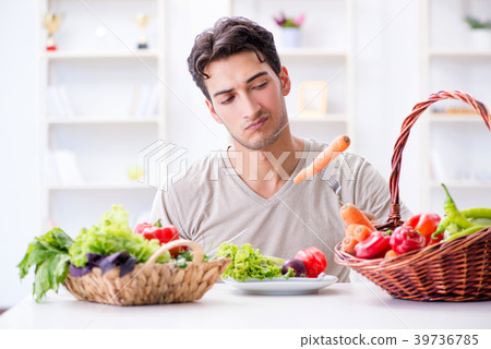 Young man in healthy eating and dieting concept 39736785