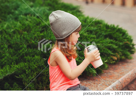 little hipster girl with coctail little hipster girl with coctail 39737897