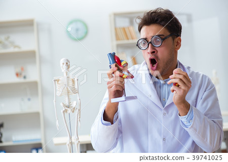 Crazy doctor with heart model 39741025