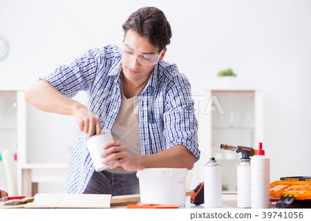 Young man in woodworking hobby concept Young man in woodworking hobby concept 39741056