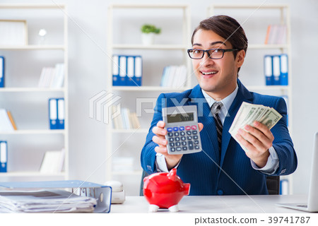 Businessman thinking about his savings during 39741787