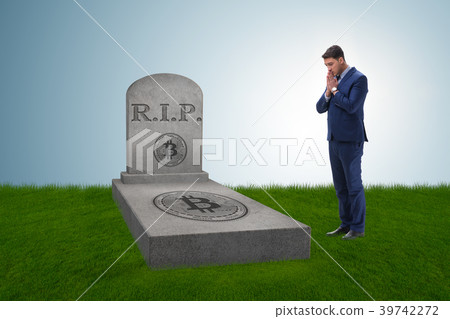 Businessman mourning the demise and death of 39742272