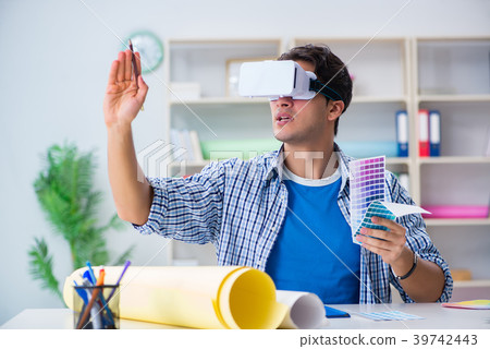 Young designer with virtual reality VR glasses Young designer with virtual reality VR glasses 39742443
