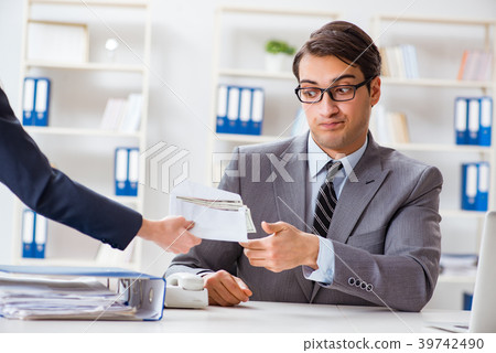Businessmanbeing offered bribe for breaking law 39742490