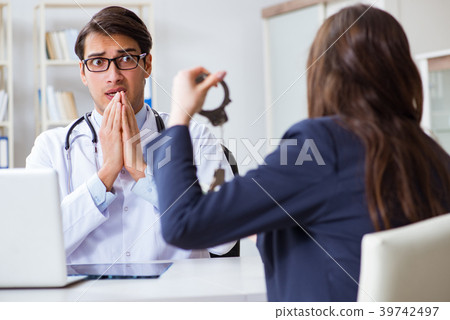 Doctor in corruption concept with being offered 39742497