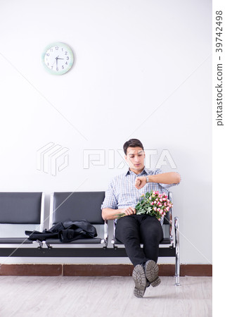 Happy dad waiting for news in maternity house Happy dad waiting for news in maternity house 39742498