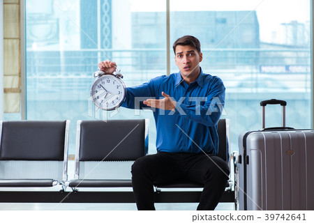 Man wairing to boarding in airport lounge room 39742641