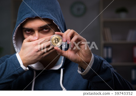 Young man in bitcoin mining concept Young man in bitcoin mining concept 39743352