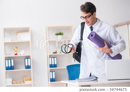 Doctor going to gym during lunch break 39744675