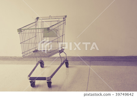 Empty shopping cart on white background. Empty shopping cart on white background. 39749642