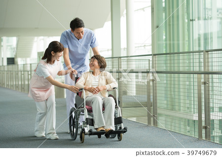 Nursing care hospital carer wheelchair medical image Nursing care hospital carer wheelchair medical image 39749679