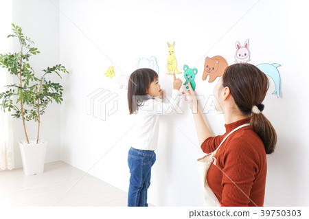 Kid playing in nursery 39750303