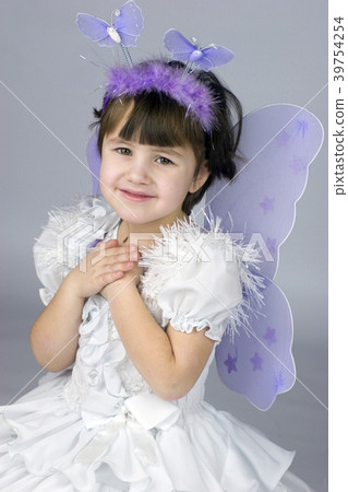 Little girl wearing fairy costume 39754254