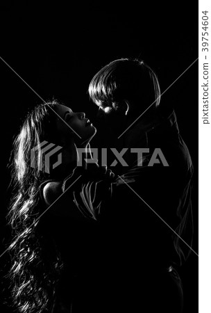 Young couple hugging Young couple hugging 39754604