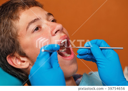 Examination by dentist Examination by dentist 39754656