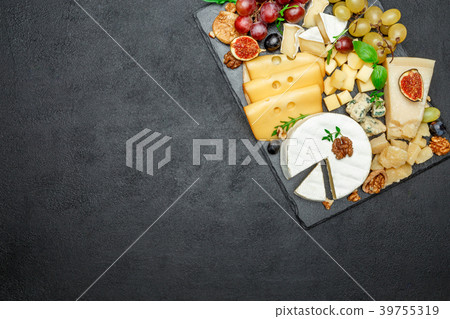 various types of cheese on stone serving board 39755319