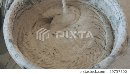 mixing concrete plaster with electric mixer mixing concrete plaster with electric mixer 39757800